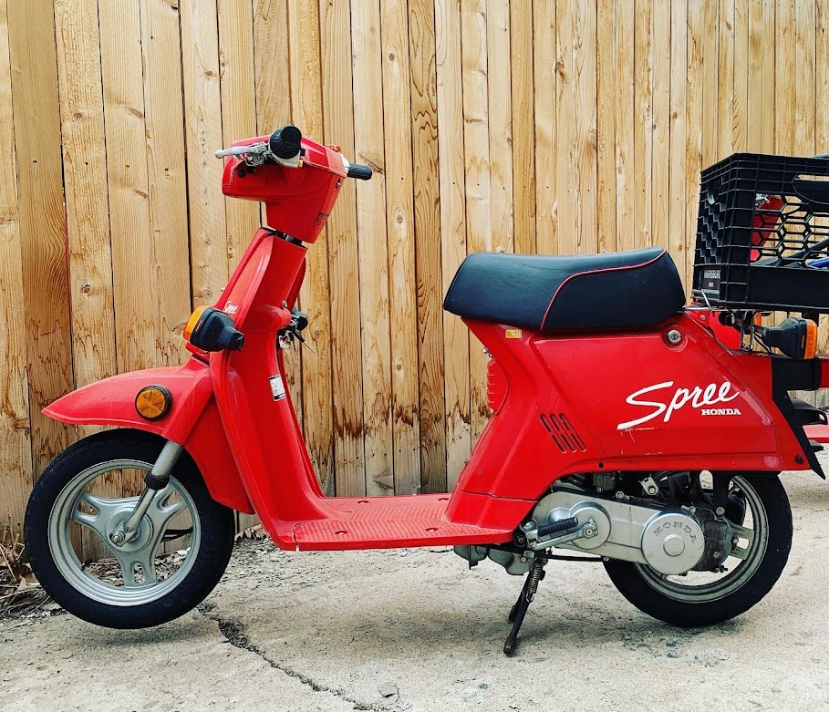 Left side view of a clean Honda Spree