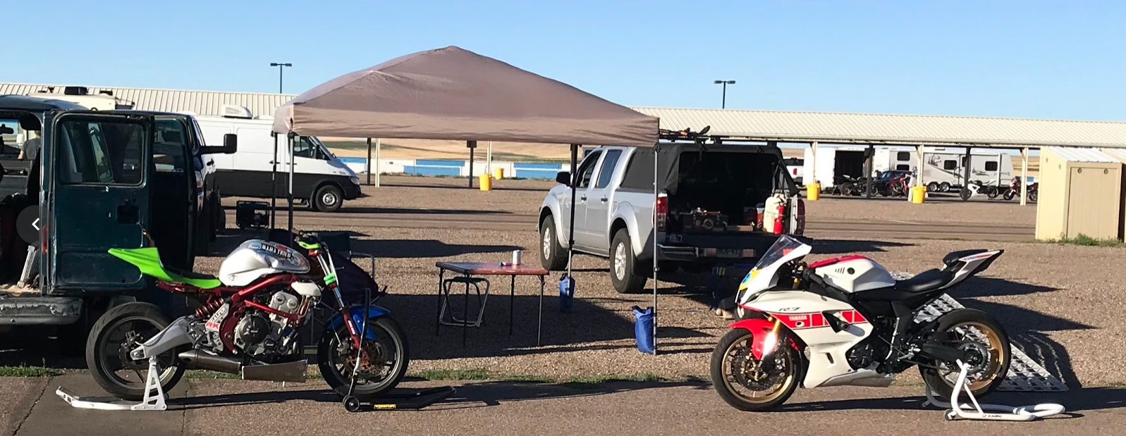 Ninja 650 and Yamaha R7 pitted together at High Plains Raceway 